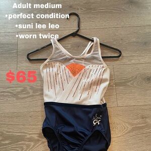 Suni Lee Leotard with Orange and Navy Design